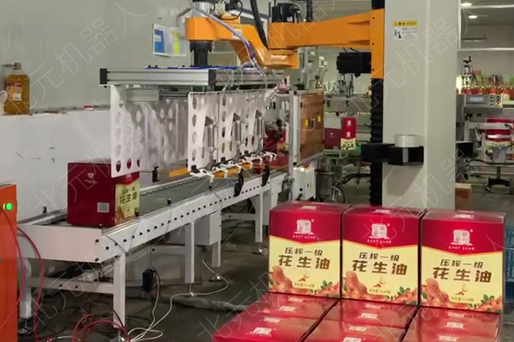 花生油自動(dòng)碼垛機(jī)，箱裝物料堆垛